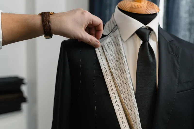 The Tiny Cut That Speaks Volumes: How a Military Tailoring Shortcut Became Fashion's Most Subtle Status Signal